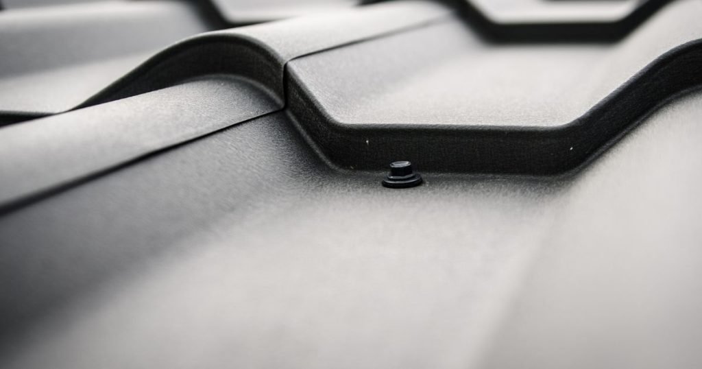 a close up of a black roof for roof inspection in Shavertown