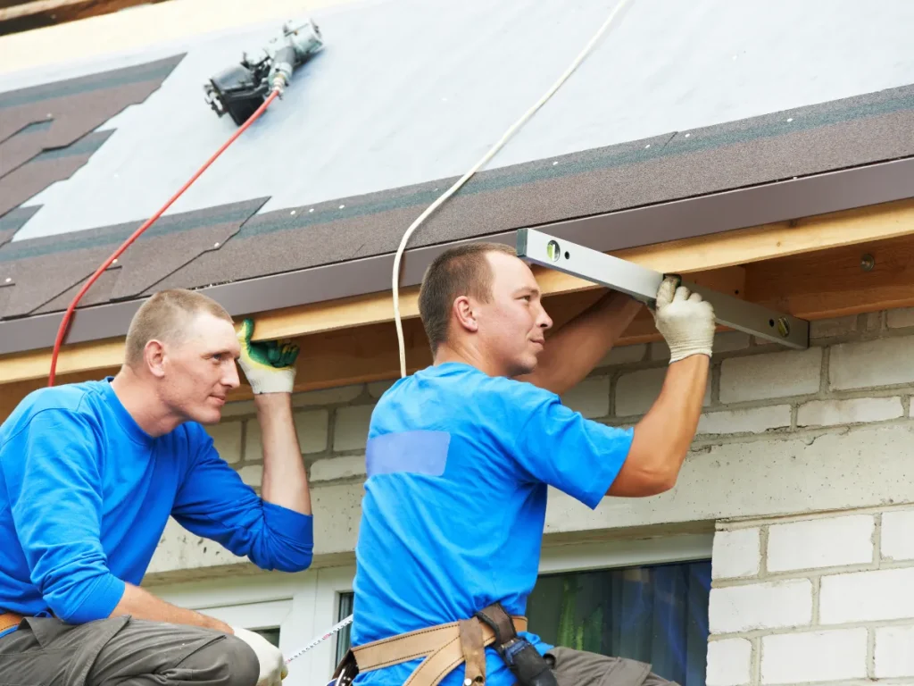 top roofing contactor men working on a roof