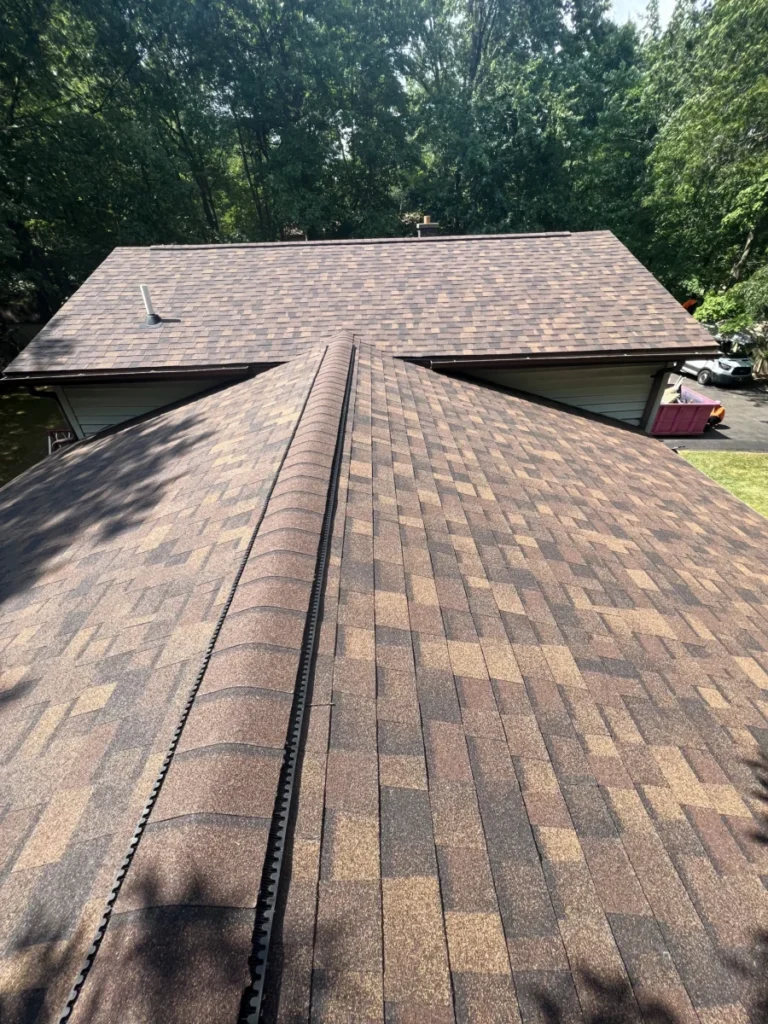 A beautifully completed residential asphalt shingle roof, showcasing top-rated services from Anthracite Roofing Systems near Wilkes-Barre, PA.